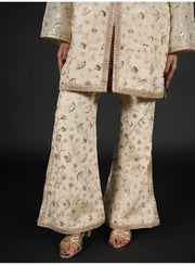 The Glided Ivory Cold -Shoulder Short Kurta And Flared Pant Set