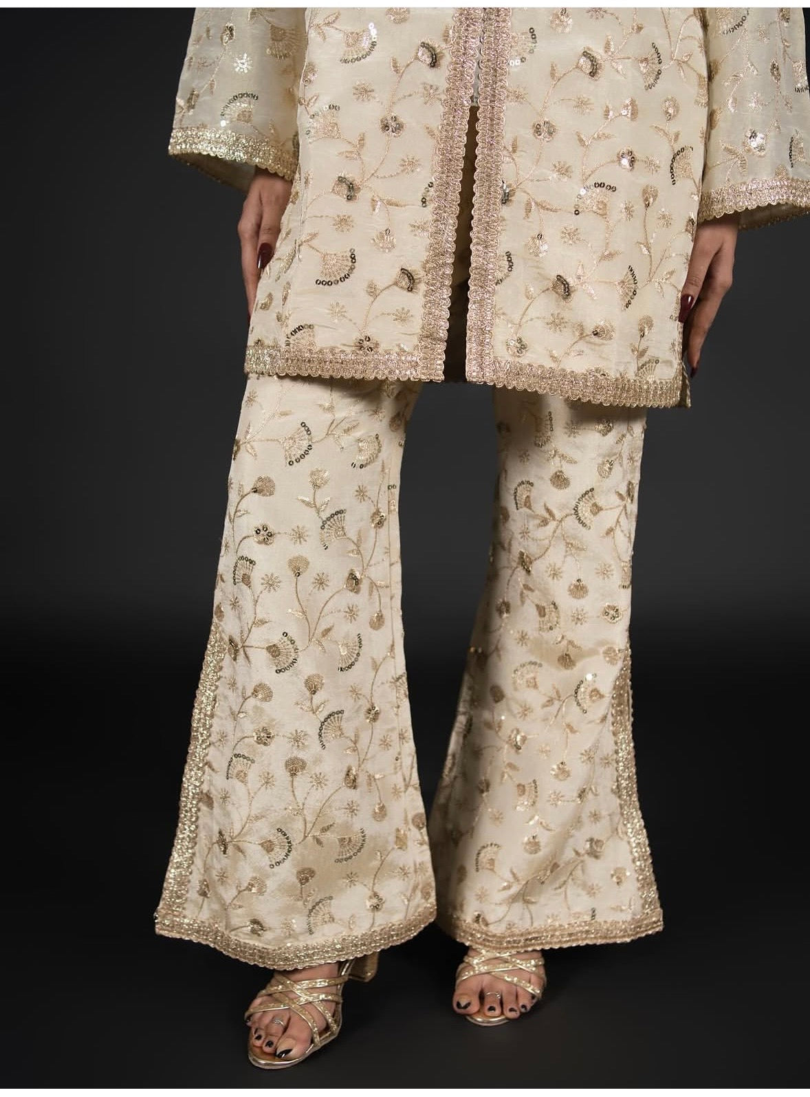 The Glided Ivory Cold -Shoulder Short Kurta And Flared Pant Set
